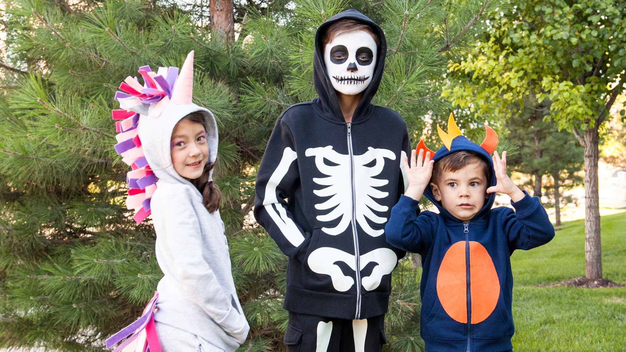 unicorn, skeleton, fish kid costumes