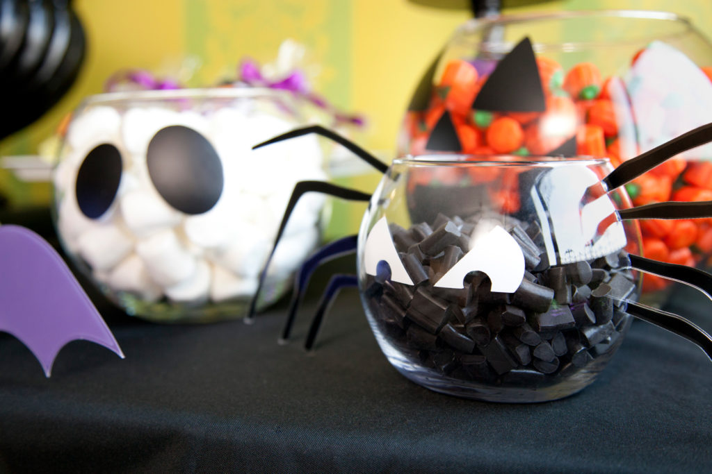 Candy bowls decorated to look like ghosts, spiders, and pumpkins
