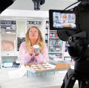 Holli Mostella filming in her craft room