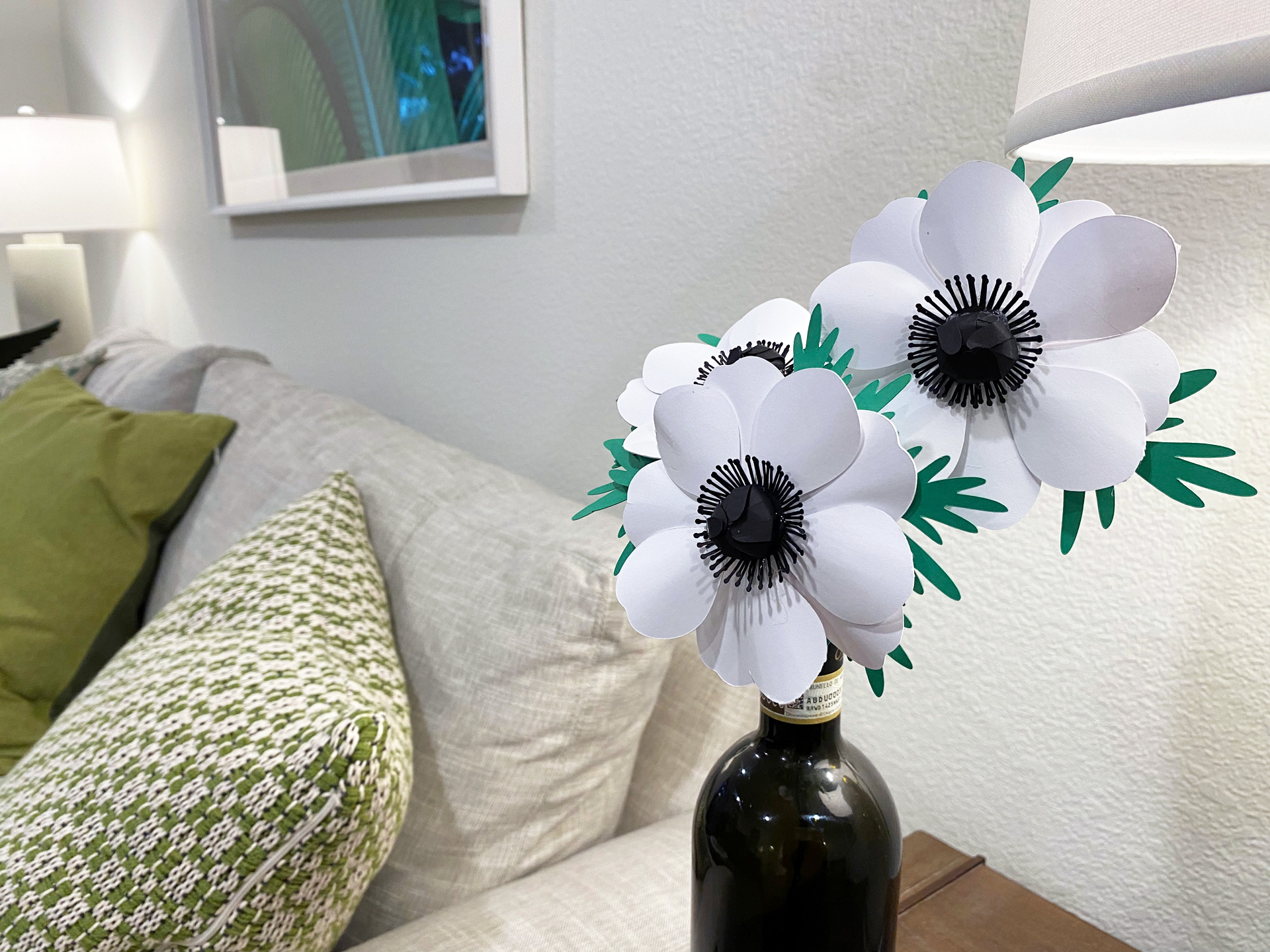 3D anemone flowers in wine bottle