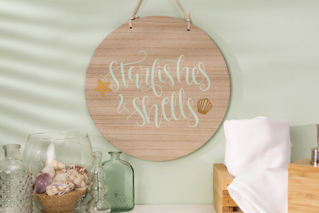 Home decor plaque with starfishes and shells