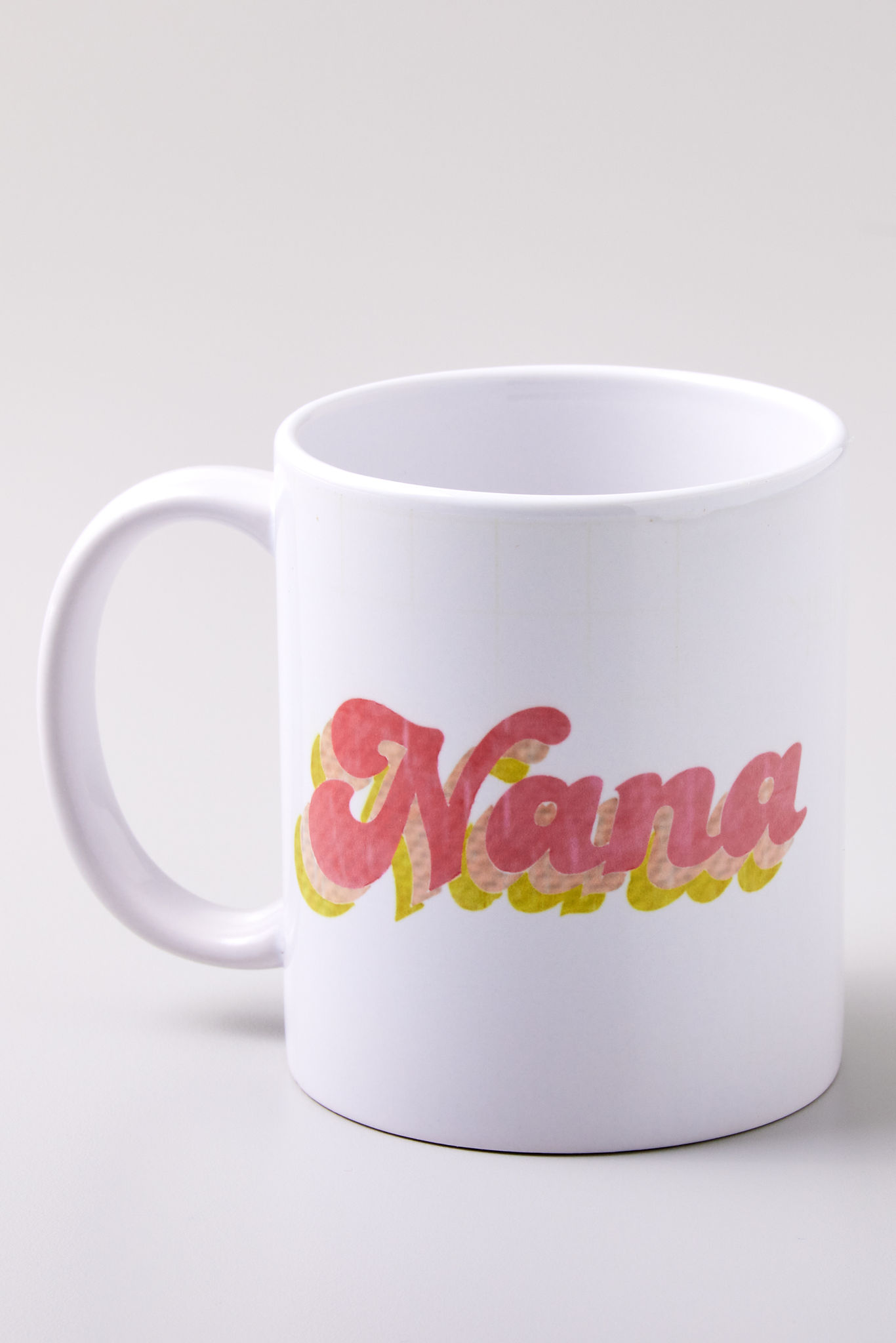 Cricut mug with the word nana used with infusible ink 
