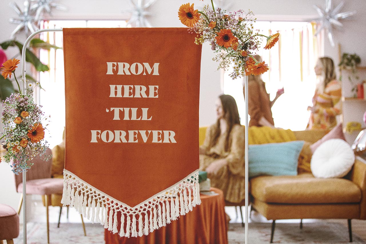 Groovy retro wedding theme engagement party banner