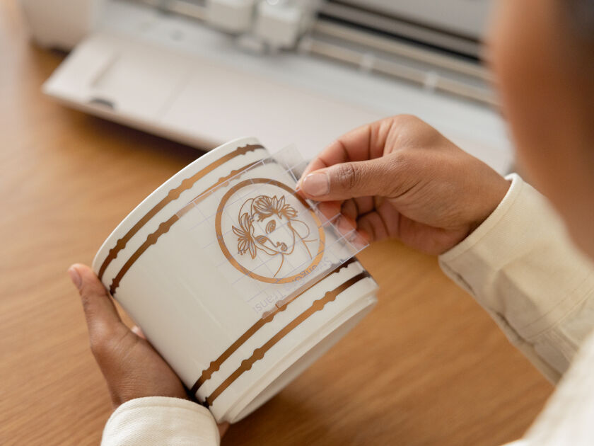 Woman's hands weeding vinyl 
