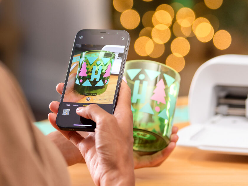 Three personalized drinking glasses sitting on a counter top