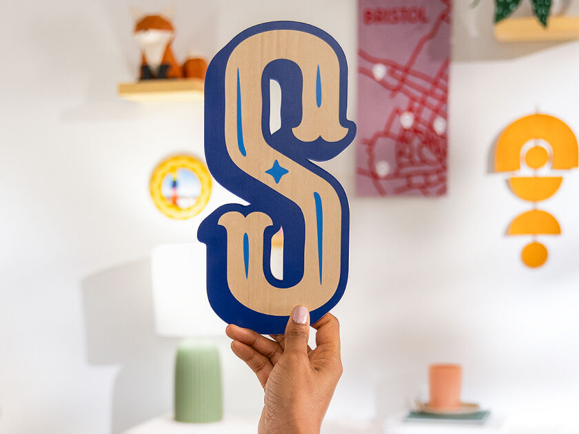 Cricut Explore 3 smart cutting machine cutting blue vinyl