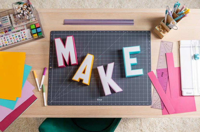 The word, "MAKE", crafted from paper.