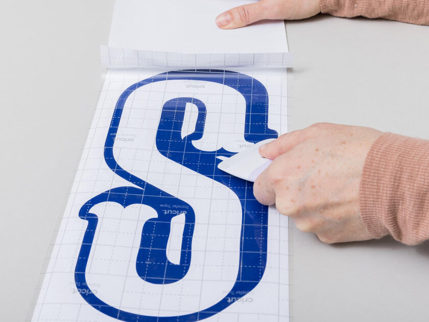 Laptop computer open with Cricut Design Space pulled up on the screen